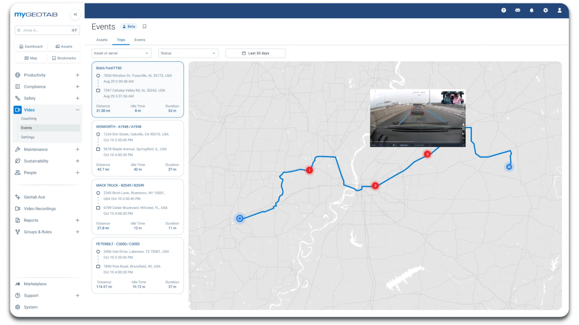 MyGeotab Video Events: trips listed with distance, idle time and duration beside a route map, with a flagged dual-facing clip opened on the trip